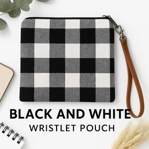 Plaid pouch bag with a zipper closure.,